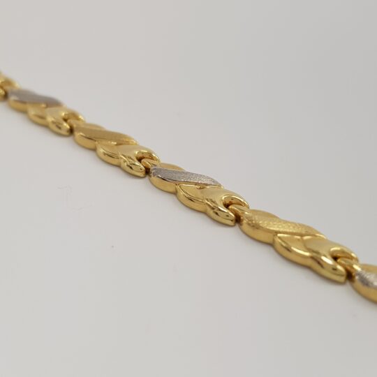 Pleciona bransoletka z żółtego i białego złota w pr.585