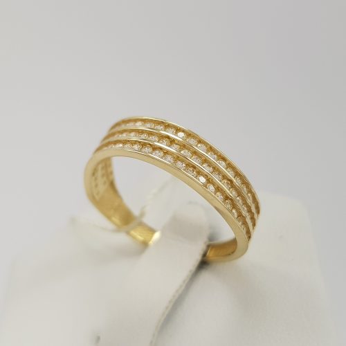 Fala z cyrkoniami - modny pierścionek złoty