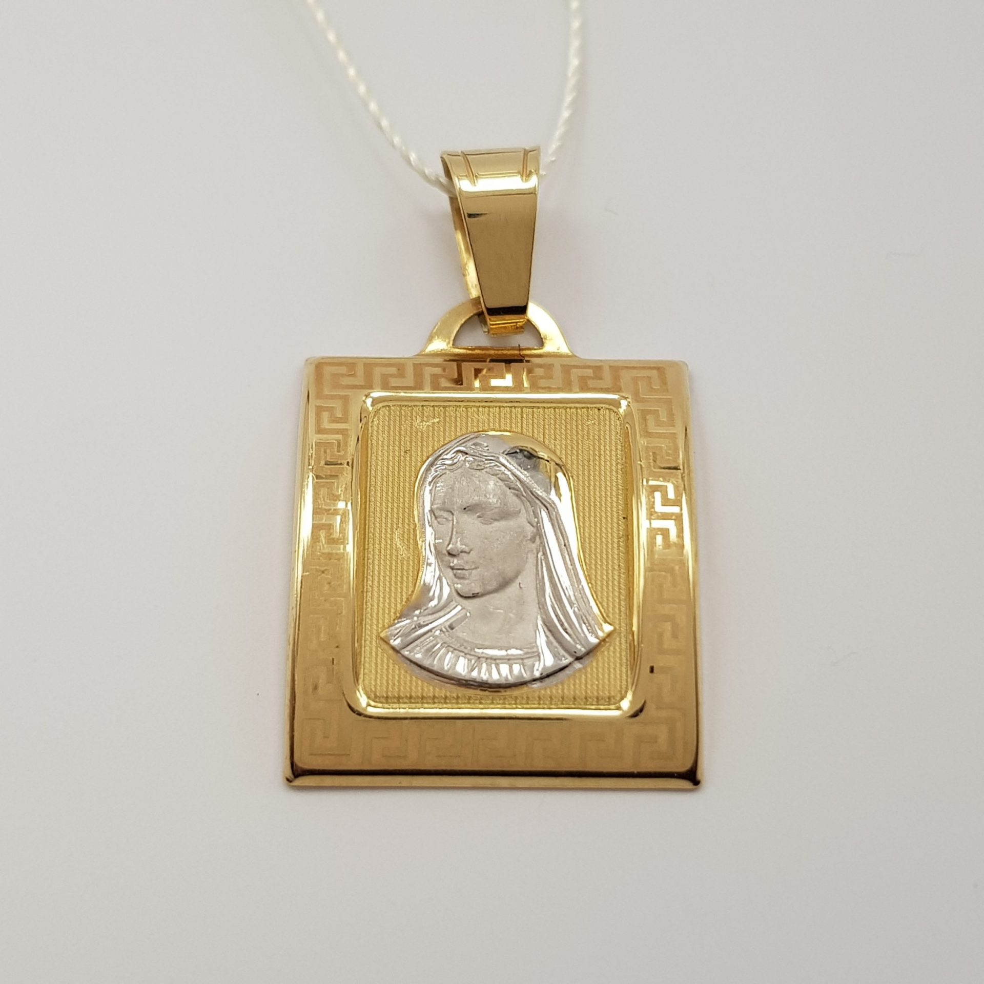 Nowoczesny medalik złoty w złocie dwukolorowym